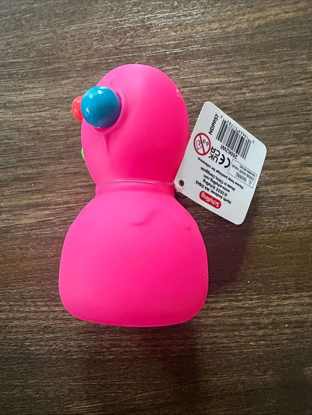 Needoh Panic Pete Bright Pink Sensory Squeeze Toy with Colorful Bumps